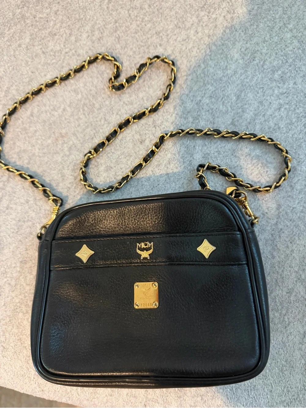 MCM Black Leather Shoulder Bag with Gold Accents